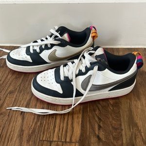 Kid’s girl’s Nike gold, silver and pink sneakers